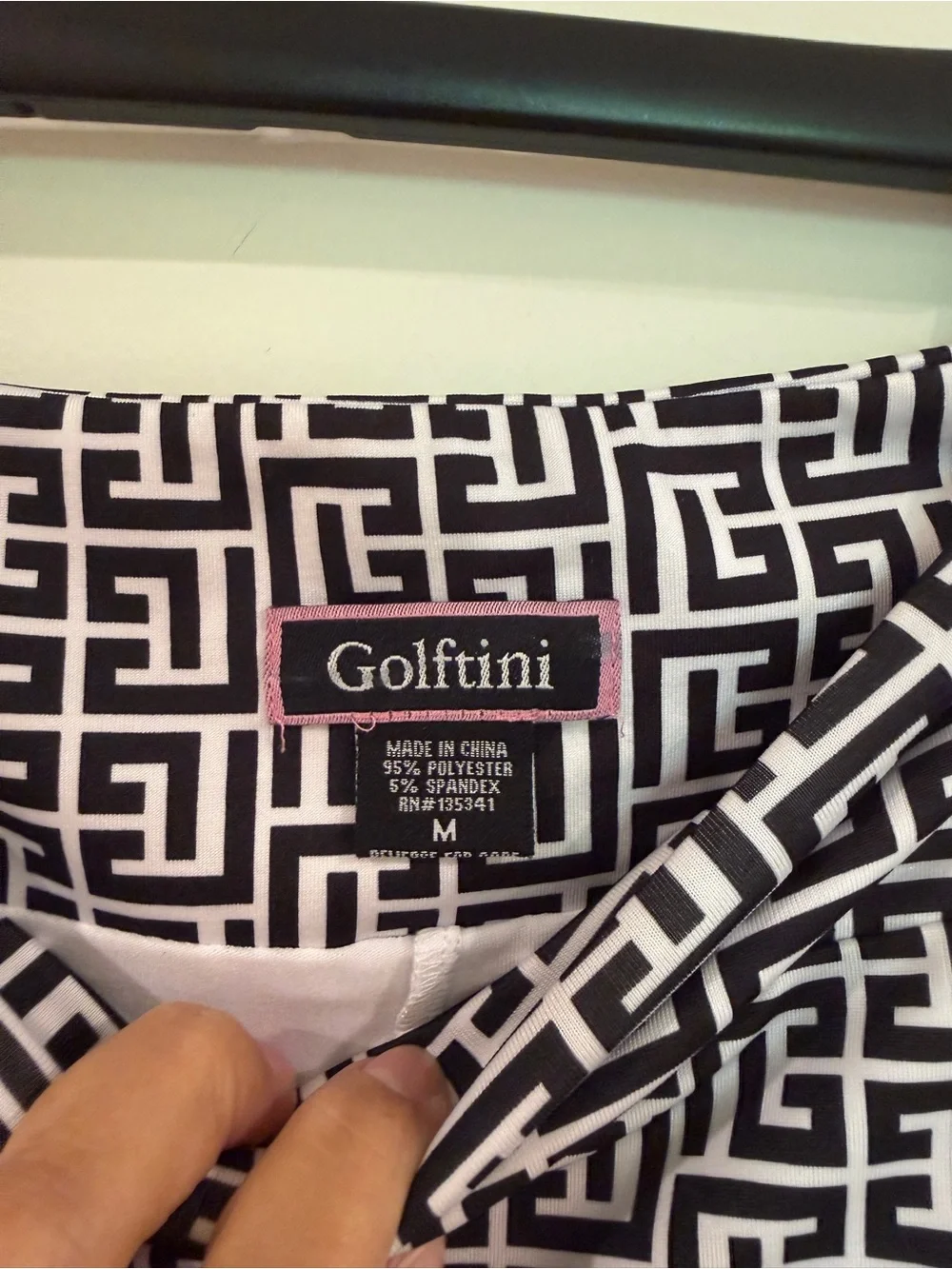 Golftini Black & White Geometric Print Women's Golf Skort with Pink Trim